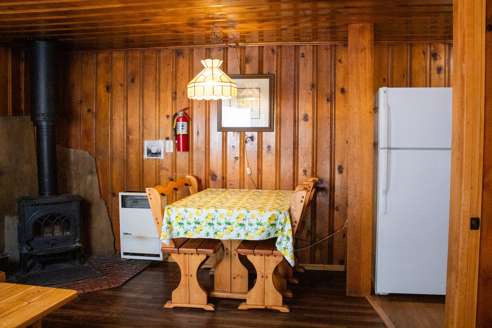 Cabin 2 Dining Table and Wood Burning Stove